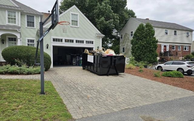 Roll-off dumpster delivered to a New Braunfels home driveway